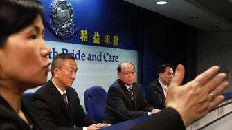 Two more arrests over attack on Hong Kong journalist