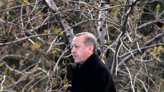 Turkey’s Erdogan heckles critic, storms out of ceremony