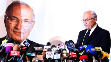 Former Egyptian Prime Minister Ahmed Shafiq reacts before a news conference in Cairo June 3, 2012. (Reuters)