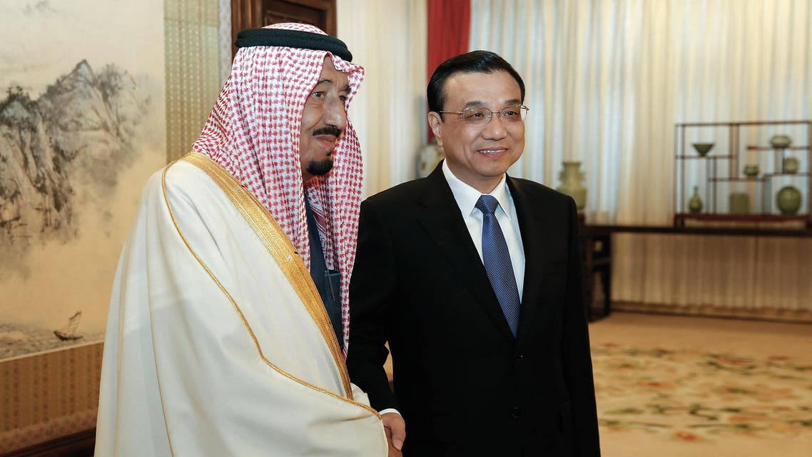 Chinese Vice Premier Li Keqiang (R) shakes hands with Saudi Arabian Crown Prince Salman bin Abdulaziz (L) at the Ziguangge Pavilion in the Zhongnanhai leaders' compound in Beijing on March 14, 2014. (AFP)