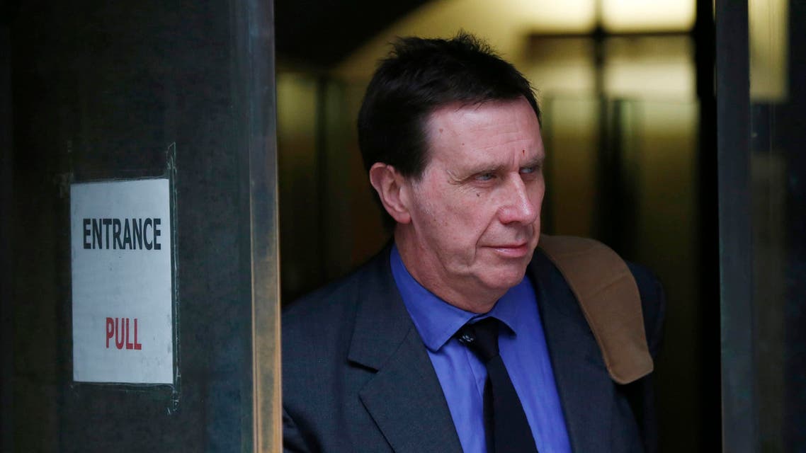 Clive Goodman, former royal editor of the News of the World, leaves the Old Bailey court in London on March 20, 2014. (Reuters)