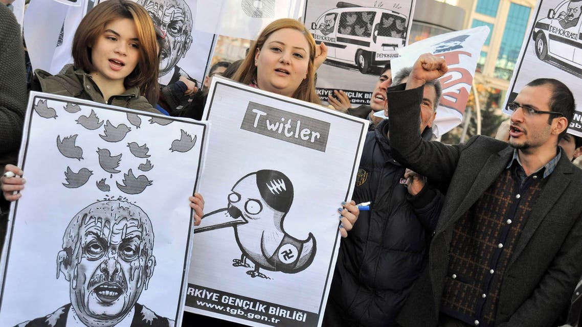 Demonstrators, members of the Turkish Youth Union, shout anti-government slogans duringa protest against a Twitter ban, in Ankara, March 21, 2014. (Reuters)