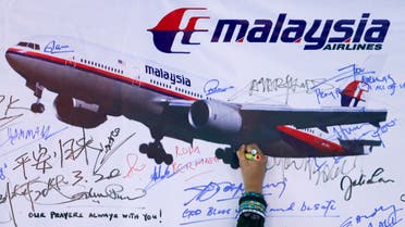 A board for passengers onboard missing Malaysia Airlines Flight MH370 and their family members. (Reuters)