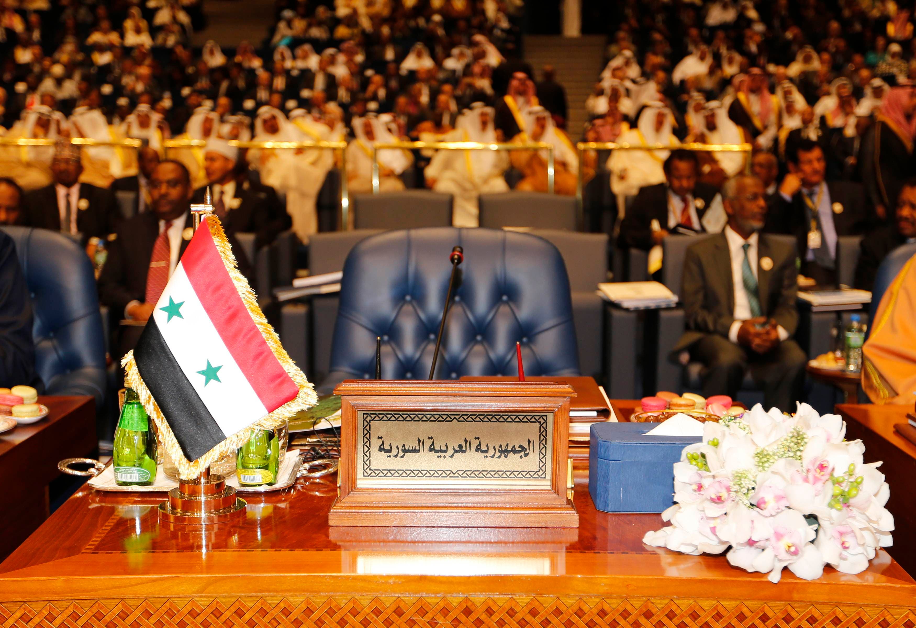 ARABS-SUMMIT/ The empty seat of the Syrian delegation is seen during the 25th Arab Summit in Kuwait City, March 25, 2014.