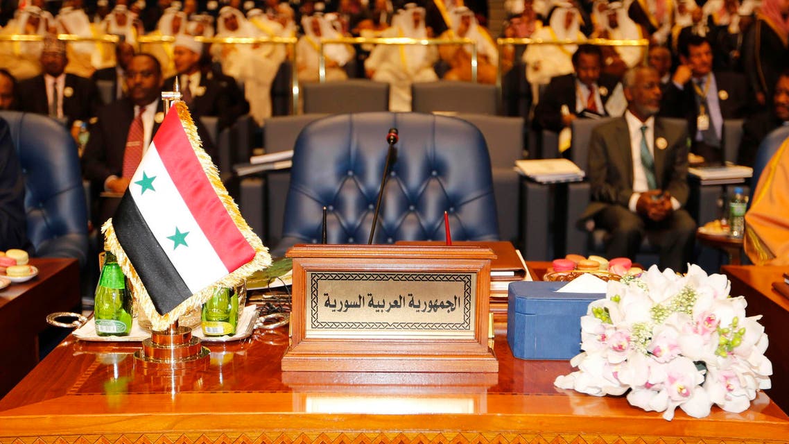 ARABS-SUMMIT/ The empty seat of the Syrian delegation is seen during the 25th Arab Summit in Kuwait City, March 25, 2014.