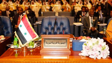ARABS-SUMMIT/ The empty seat of the Syrian delegation is seen during the 25th Arab Summit in Kuwait City, March 25, 2014. 