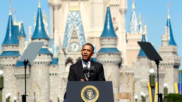 U.S. President Barack Obama unveils a strategy aimed at boosting tourism and travel in front of Cinderella's Castle at Disney World's Magic Kingdom in Orlando January 19, 2012. reuters