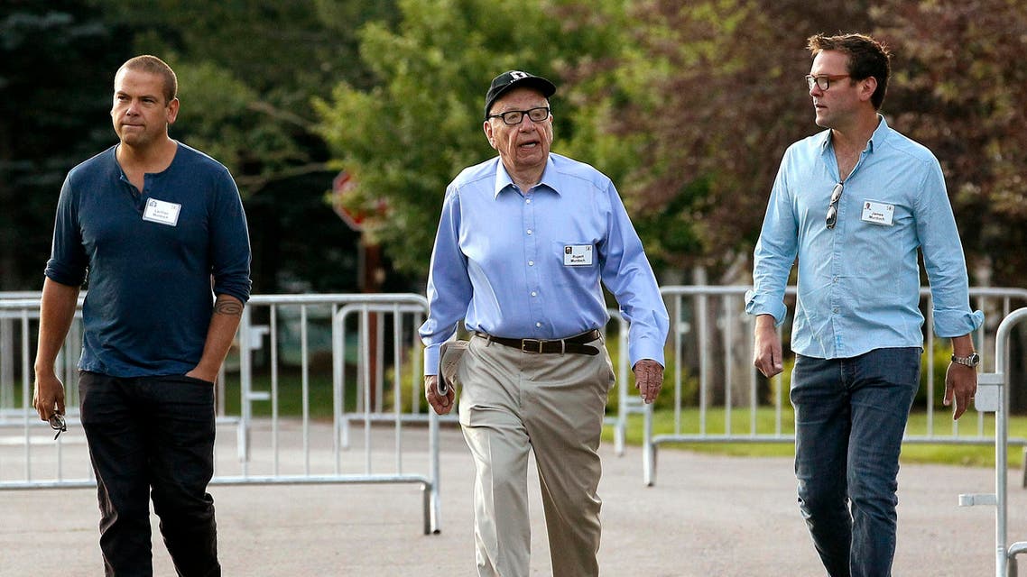 Rupert Murdoch walks with sons Lachlan (L) and James (R). (File photo: Reuters)