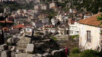 Syrian rebels and army clash over coastal town