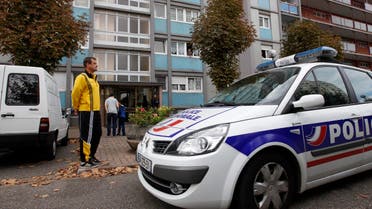 A police car is seen parked in front of a building in the Esplanade suburb of Strasbourg October 6, 2012.
