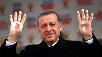 Erdogan sues four journalists, ex-police chief