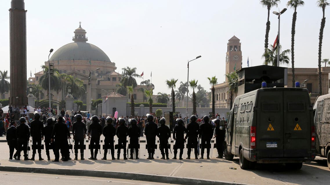 Riot police officers take positions in front of Cairo University. (File photo: Reuters)