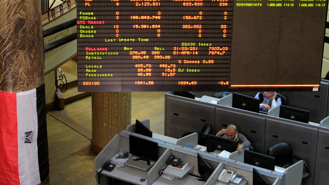 A trader works at the Egyptian stock exchange in Cairo April 1, 2014.