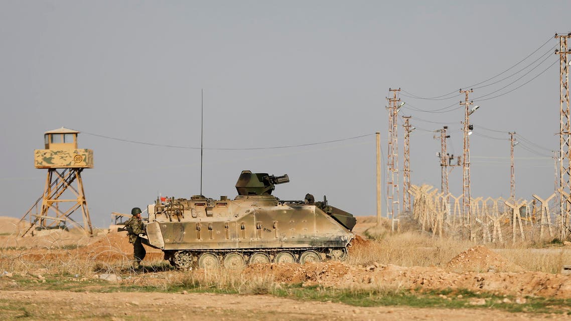Turkish troops stand guard on the Turkish-Syrian border in Ceylanpinar, southern Sanliurfa province. (File photo Reuters)