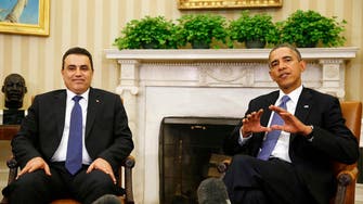 Obama praises Tunisia as model of Arab Spring 