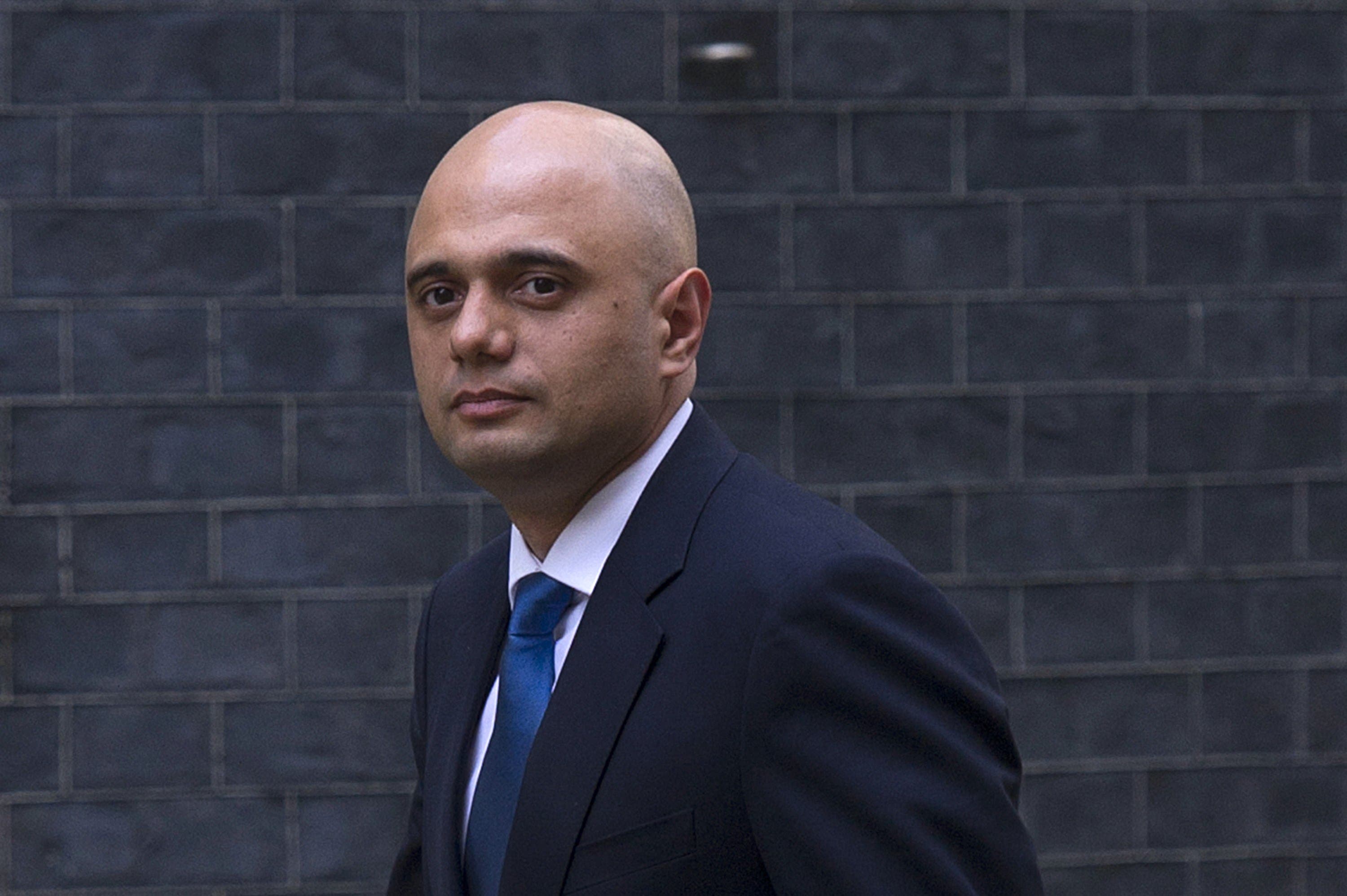Sajid Javid, arrives in Downing Street in central London on April 9, 2014 after being appointed to replace Maria Miller as British Culture Secretary. (AFP)