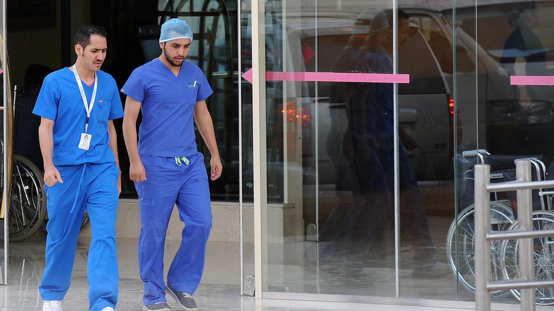  Saudi medical staff leave the emergency department at a hospital in the center of the Saudi capital Riyadh on April 8, 2014. (AFP)