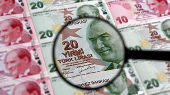 Moody’s cuts Turkey’s outlook, lira weakens, yields rise