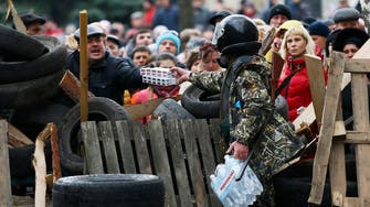 Armed men seize eastern Ukraine police station