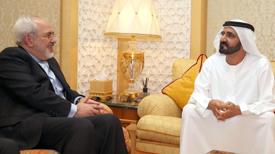 Sheikh Mohammed Bin Rashid al-Maktoum (R), ruler of Dubai, receiving Iranian Foreign Minister Mohammed Javad Zarif (L) in Dubai on April 15, 2014. (AFP)