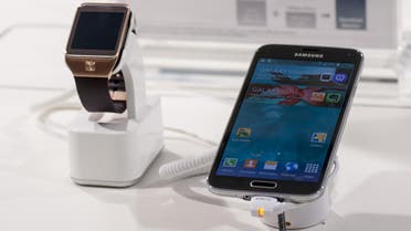 The Samsung Galaxy S5 and Gear 2 smartwatch on display at the Mobile World Congress 2014. (File photo: Shutterstock)