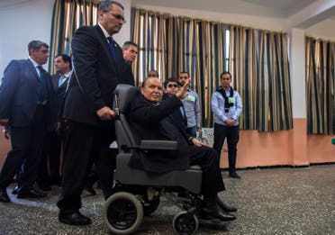 Algeria's President Abdelaziz Bouteflika (seated) arrives to cast his ballot during the presidential election in Algiers April 17, 2014. (Reuters)