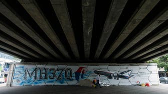 Australia sees new search phase if mini-sub fails to find MH370