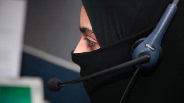 A female Saudi telephone operator works at the International Medical Center in Jeddah, pictured on June 4, 2007. (File photo: Reuters)