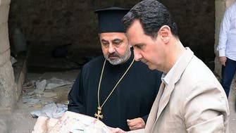 On Easter Sunday, Assad visits recaptured Christian town