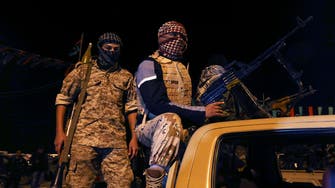 Libyan jihadist group parades sobbing hostage