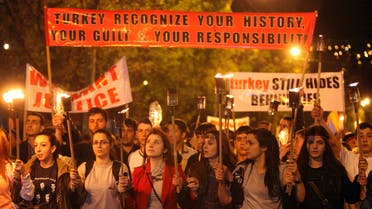 Demonstrators attend a torch-bearing march marking the anniversary of the 1915 mass killings of Armenians in the Ottoman Empire, in Yerevan April 23, 2014. (Reuters)
