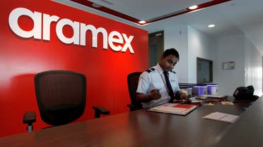 An employee is seen at the distribution warehouse of the Aramex Emirates head offices at Dubai Logistics City in Jebel Ali. (Reuters)
