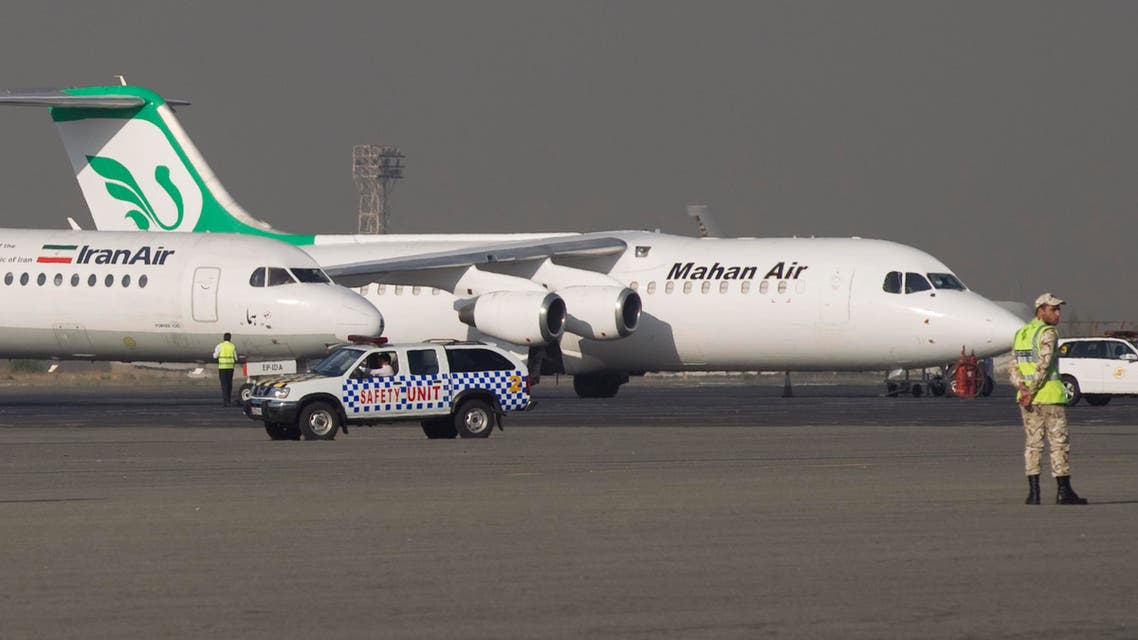 A jet of the Iranian airline Mahan Air is seen in background at Tehran's Mehrabad airport. (File photo Reuters)