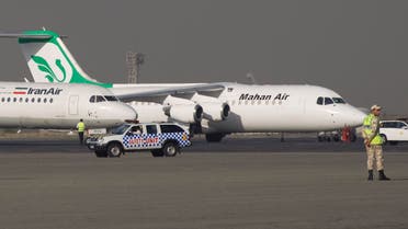 A jet of the Iranian airline Mahan Air is seen in background at Tehran's Mehrabad airport. (File photo Reuters)