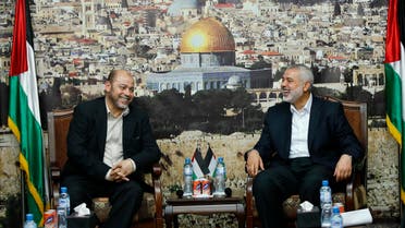 Senior Hamas leader Moussa Abu Marzouk (L) meets with the head of the Hamas government Ismail Haniyeh in Gaza City April 21, 2014. (Reuters)