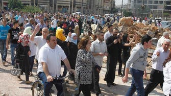 Civilians start returning to battered Homs 