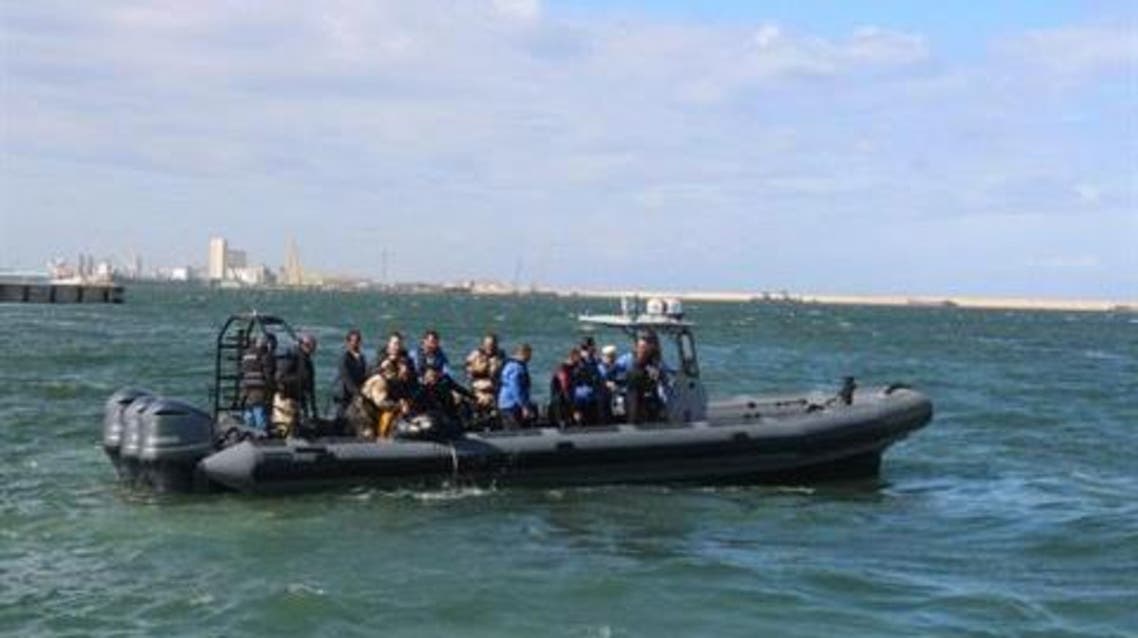 Members of Libya's coastguard undergo a rescue exercise during training provided by the European Union, in Tripoli, Nov. 13, 2013. (File photo Reuters)