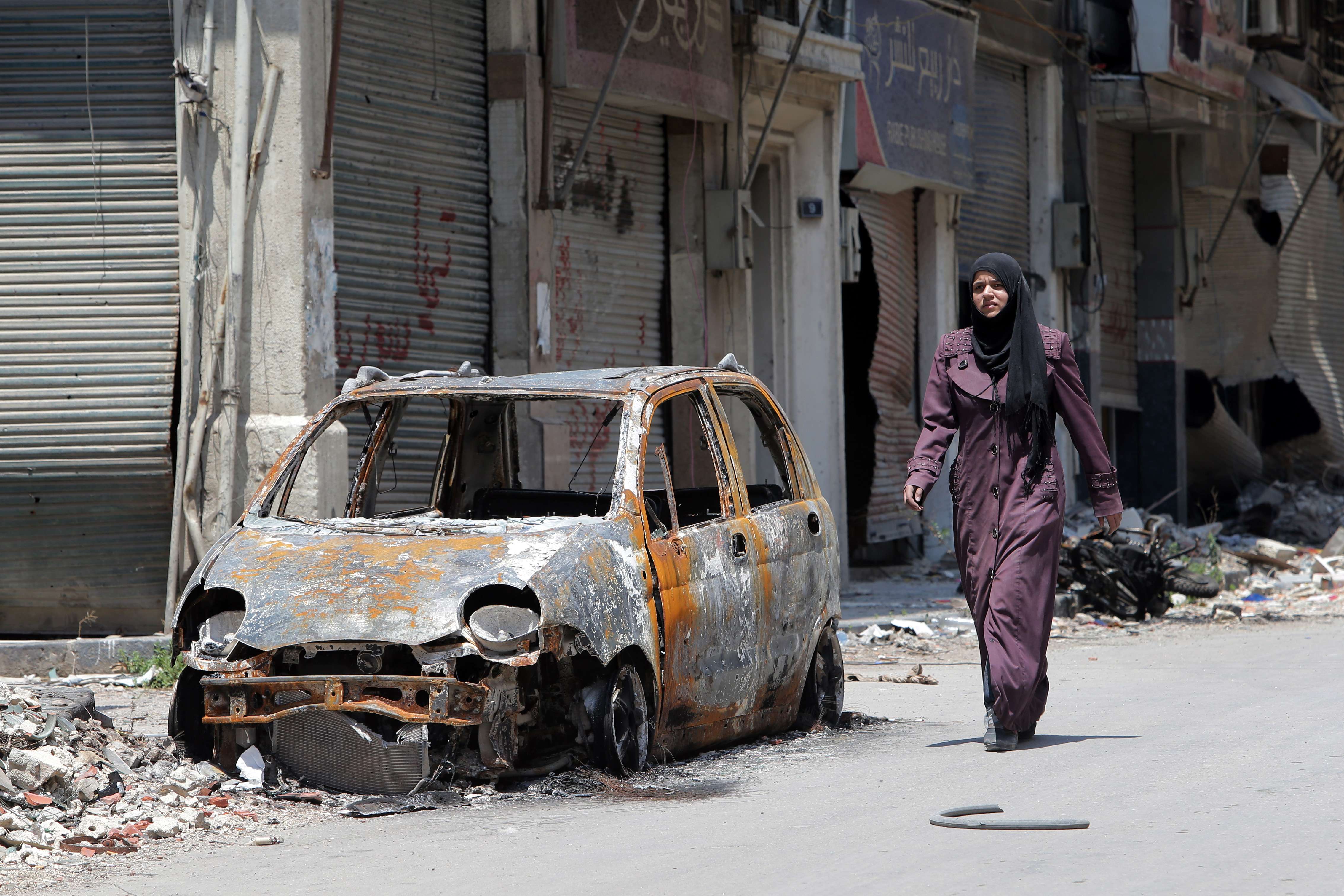 Syrians Return Home To Homs