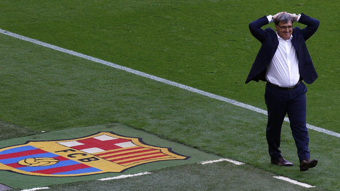 Barcelona's Argentinian coach Gerardo "Tata" Martino reacts during the Spanish league football match FC Barcelona vs Club Atletico de Madrid at the Camp Nou stadium in Barcelona on May 17, 2014. AFP