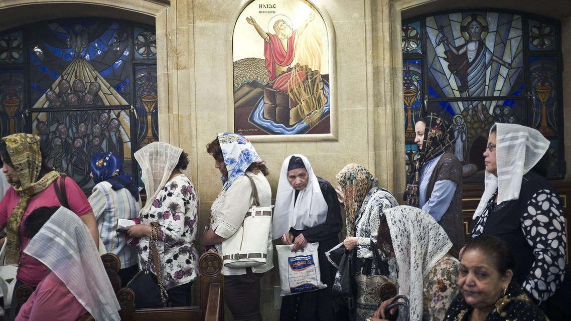Egyptian Coptic Christians attend a Friday Mass
