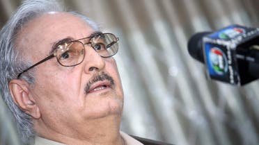 Retired Libyan Army general Khalifa Haftar speaks during a press conference in the town of Abyar, 70 km southwest of Bengahzi, on May 17, 2014. (AFP)