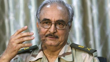 General Khalifa Haftar speaks during a news conference at a sports club in Abyar, a small town to the east of Benghazi. May 17, 2014. (Reuters)