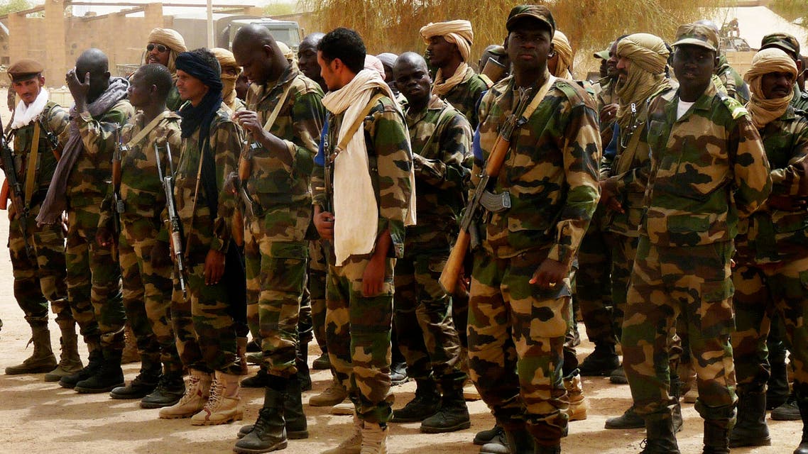 Malian soldiers line up in a military camp in the northern town of Kidal, July 17, 2013. (Reuters)