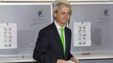 ar-right politician Geert Wilders of the anti-immigration Dutch Freedom (PVV) Party casts his vote during the European Parliament elections, in an elementary school in the Hague May 22, 2014. 