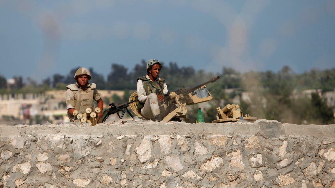 Armed men launched a series of attacks on Sunday on security checkpoints in the North Sinai towns of Sheikh Zuweid and El Arish close to Egypt's border with Israel and the Gaza Strip. Reuters