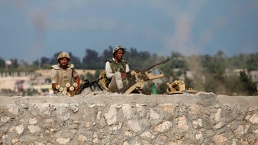 Armed men launched a series of attacks on Sunday on security checkpoints in the North Sinai towns of Sheikh Zuweid and El Arish close to Egypt's border with Israel and the Gaza Strip. Reuters
