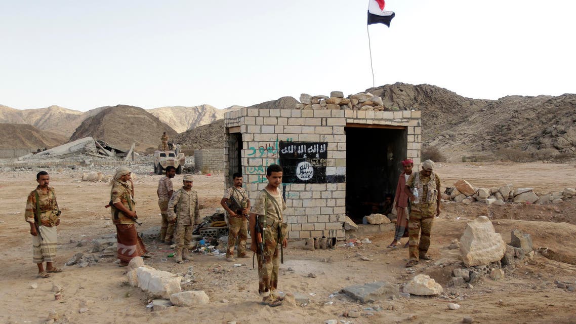 Soldiers stand at a post which was previously controlled by al Qaeda insurgents in al-Mahfad, in the southern Yemeni province of Abyan May 23, 2014. (Reuters)