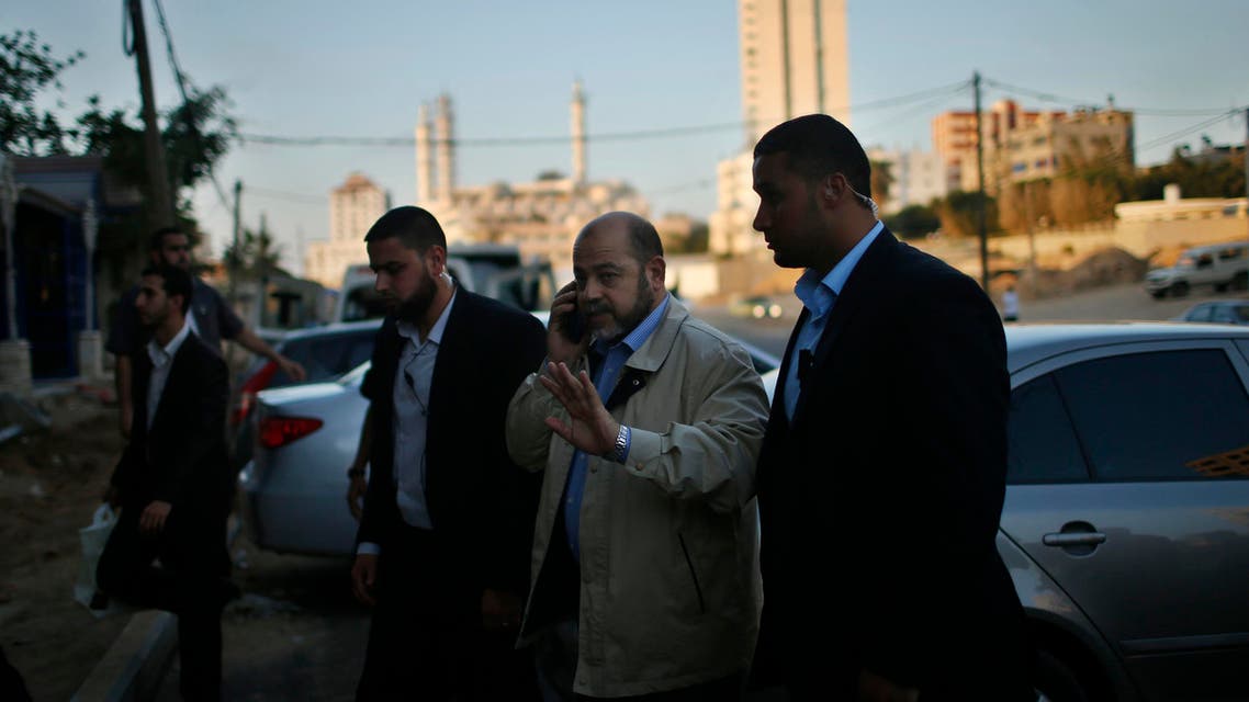 Senior Hamas leader Moussa Abu Marzouq arrives to meet with senior Fatah official Azzam Al-Ahmed in Gaza City May 26, 2014.