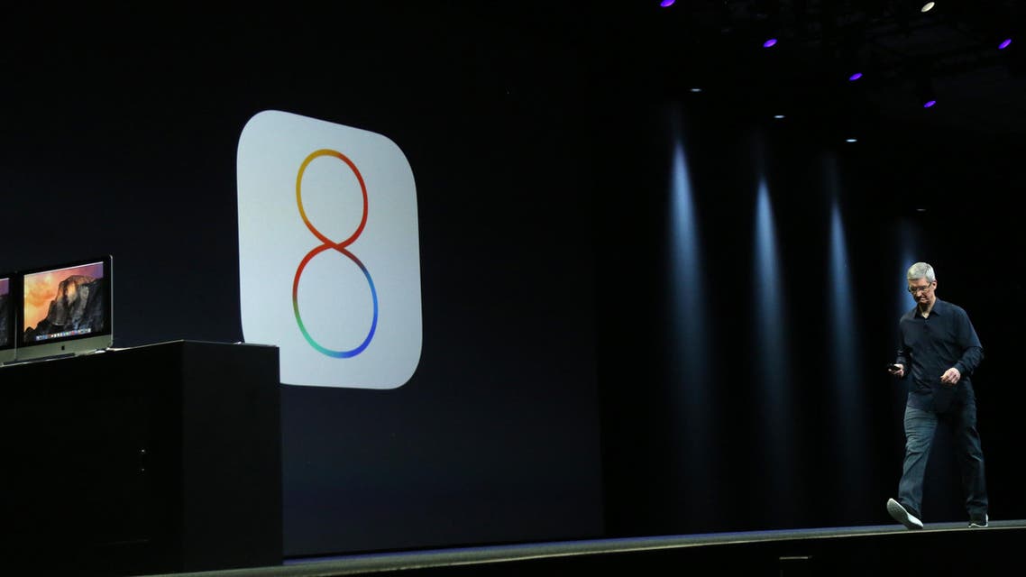 Apple CEO Tim Cook introduces the IOS 8 operating system during his keynote address at the Worldwide Developers Conference in San Francisco, California June 2, 2014.