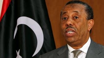 Libya’s interim PM to stay for now after rival takes office